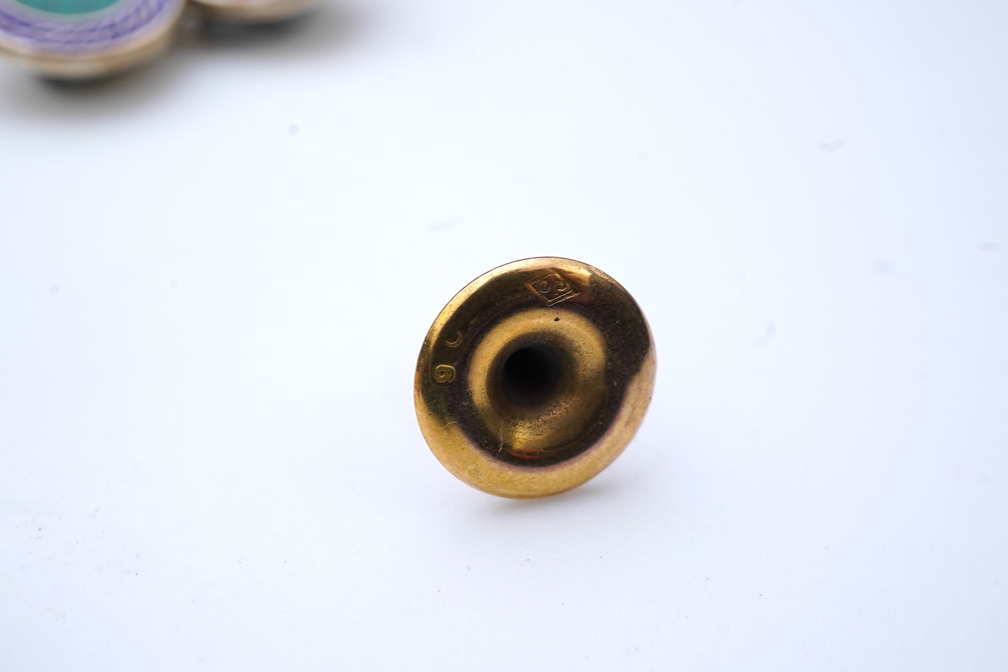 A collection of cufflinks and dress studs